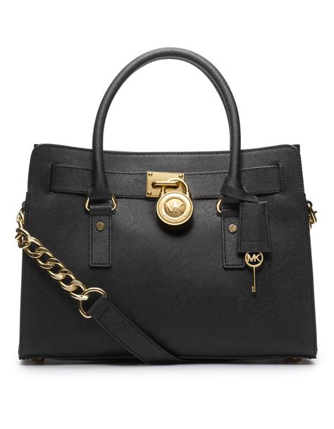 do any michael kors bags have black lining|Michael Kors hand bag price.